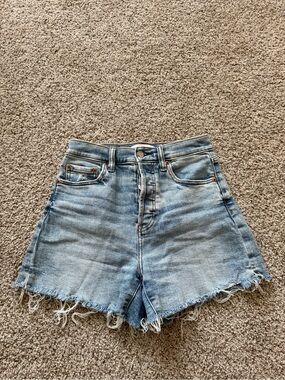High-Waist Light Blue Denim Shorts with Frayed Hem